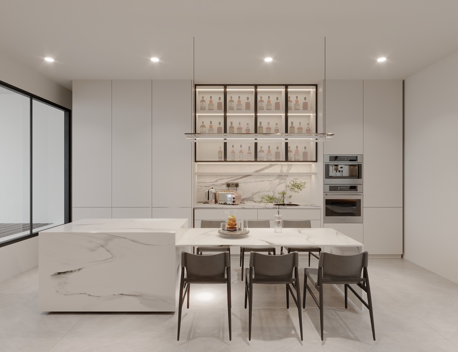 Open-plan kitchen with a marble island, glass display cabinets and a dining table, seen from the front
