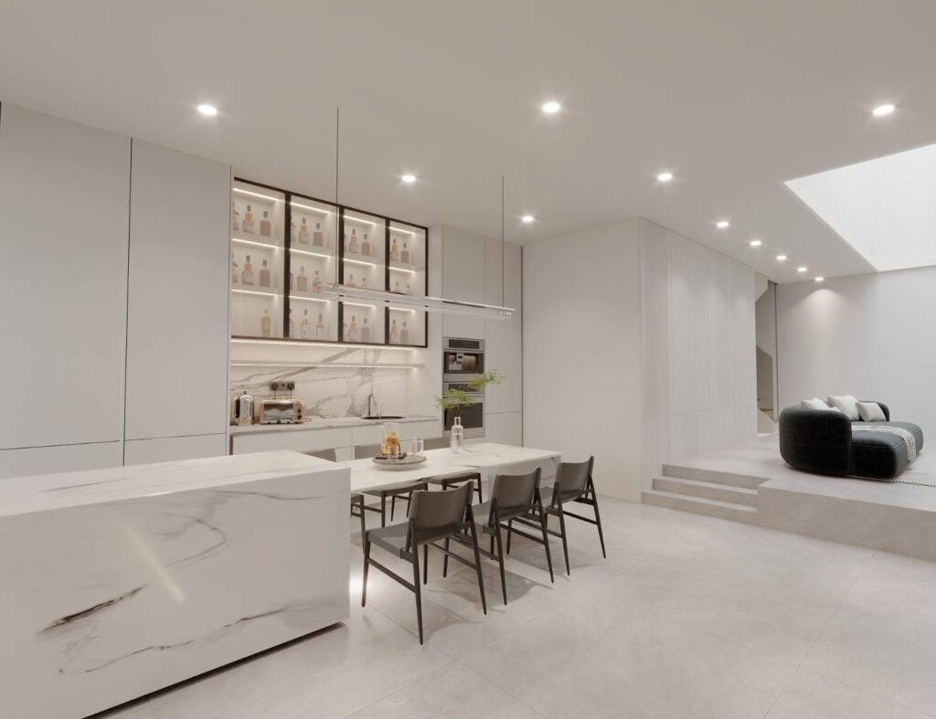 Wide view of the kitchen and dining area with the sunken living area and skylight beyond