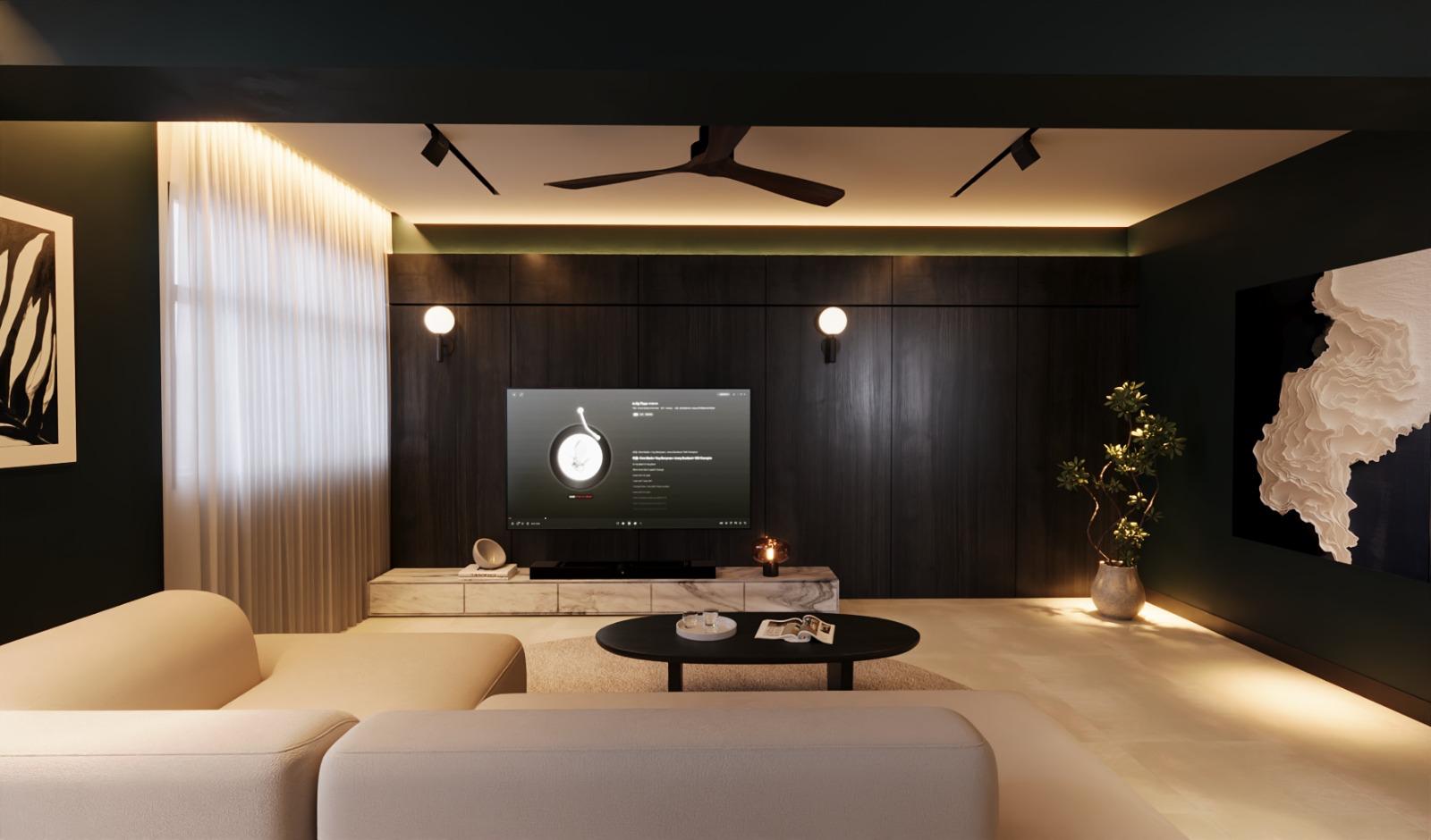Living room TV wall in dark timber with cove lighting and a cream sofa in the foreground