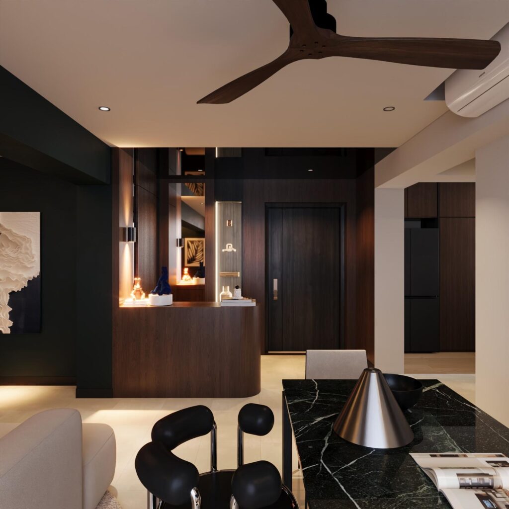 Curved timber console and entrance door seen from the dining area, with the edge of a green marble table