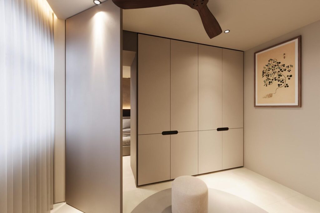 Walk-in wardrobe room with cream cabinetry and a framed botanical print